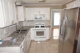  This Lovely Three-Bedroom House Is Located in The Roberts Elem in Little Rock, AR (Photo 3 of 3)