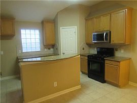 This Home Features a Glass Front Door, Hardwood Floors in The E in Houston, TX (Photo 3 of 5)