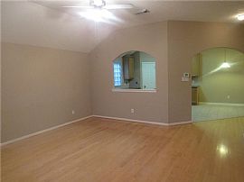 This Home Features a Glass Front Door, Hardwood Floors in The E in Houston, TX (Photo 5 of 5)