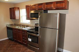 7401 Watson Ln, Louisville, Ky   5 Beds 2 Baths in Louisville, KY (Photo 5 of 8)