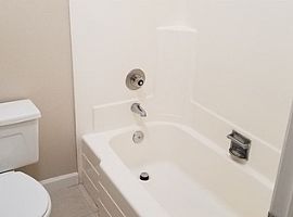 The Property Has Neutral Tiled Floors Downstairs and Carpet Ups in Mission Viejo, CA (Photo 10 of 10)