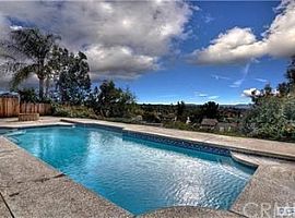 The Property Has Neutral Tiled Floors Downstairs and Carpet Ups in Mission Viejo, CA (Photo 6 of 10)