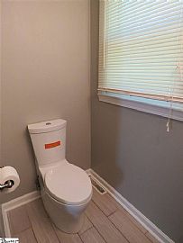 112 Folkstone St  Enjoy This 4 Bedroom 3 Bath Tri-Level Home in Greenville, SC (Photo 10 of 11)