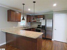 112 Folkstone St  Enjoy This 4 Bedroom 3 Bath Tri-Level Home in Greenville, SC (Photo 7 of 11)