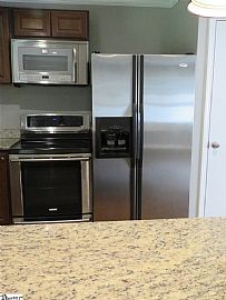 112 Folkstone St  Enjoy This 4 Bedroom 3 Bath Tri-Level Home in Greenville, SC (Photo 8 of 11)