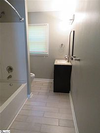 112 Folkstone St  Enjoy This 4 Bedroom 3 Bath Tri-Level Home in Greenville, SC (Photo 9 of 11)