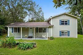 This Is a Country Charm Home with City Convenience. 1.5 Story A in Gulfport, MS