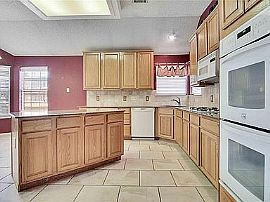 1023 Essex Dr This Spacious 4 Bedroom, 2 Living in Cedar Hill, TX (Photo 3 of 5)