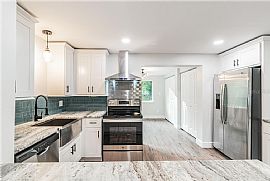 This Great Home Is Located Minutes From The Water. Beautifully  in Tampa, FL (Photo 2 of 6)