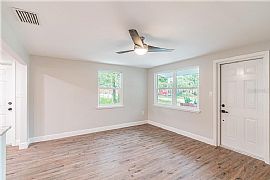 This Great Home Is Located Minutes From The Water. Beautifully  in Tampa, FL (Photo 4 of 6)