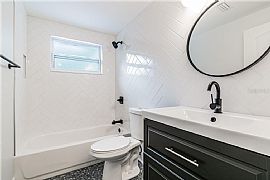 This Great Home Is Located Minutes From The Water. Beautifully  in Tampa, FL (Photo 5 of 6)