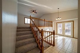 Enjoy The Morning Sunshine in The Large Upper Level Living Room in Sioux Falls, SD (Photo 3 of 6)