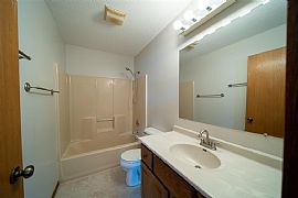 Enjoy The Morning Sunshine in The Large Upper Level Living Room in Sioux Falls, SD (Photo 6 of 6)