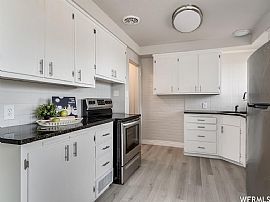 Spacious Updated Rambler with 6 Bedrooms and Fully Finished Bas in Ogden, UT (Photo 3 of 5)