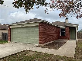 This Charming 3/2 House with a Wonderful Fireplace and Abundanc in Kyle, TX