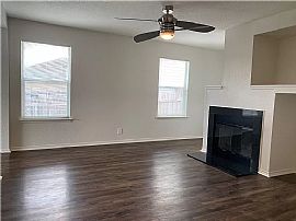 This Charming 3/2 House with a Wonderful Fireplace and Abundanc in Kyle, TX (Photo 2 of 12)