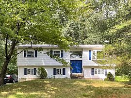 This 3-Bedroom Raised Ranch Sits in a Convenient, Quiet Place.  in Guilford, CT