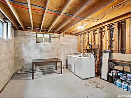 10545 Chatanika Loop, Eagle River, Ak 99577  Peaceful House in Eagle River, AK (Photo 4 of 9)