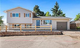 This Lovely Deerfield Hills Tri-Level Offers 3 Bedrooms in Colorado Springs, CO