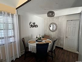 Beautiful Raised Ranch, Totally Renovated. Move in Ready in Howard Beach, NY (Photo 4 of 11)