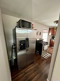 Beautiful Raised Ranch, Totally Renovated. Move in Ready in Howard Beach, NY (Photo 5 of 11)