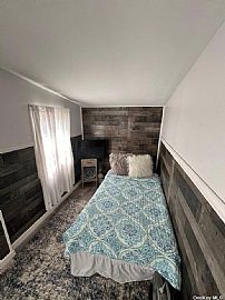 Beautiful Raised Ranch, Totally Renovated. Move in Ready in Howard Beach, NY (Photo 8 of 11)