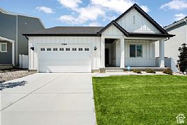 Home Featuring a Modern Aesthetic Throughout. It Boasts a Spaci in Lehi, UT