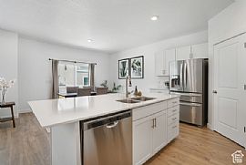 Home Featuring a Modern Aesthetic Throughout. It Boasts a Spaci in Lehi, UT (Photo 4 of 12)