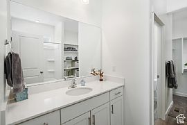 Home Featuring a Modern Aesthetic Throughout. It Boasts a Spaci in Lehi, UT (Photo 7 of 12)