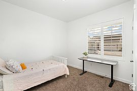 Home Featuring a Modern Aesthetic Throughout. It Boasts a Spaci in Lehi, UT (Photo 8 of 12)