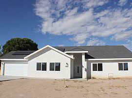 Beautiful 4-Bedroom + Bonus/office Room, 3-Bathroom Home in Cal in California City, CA