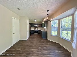 Updated 3-Bed, 2-Bath Home with Expansive Fully-Fenced Backyard in Jacksonville, FL (Photo 3 of 11)