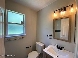 Updated 3-Bed, 2-Bath Home with Expansive Fully-Fenced Backyard in Jacksonville, FL (Photo 7 of 11)