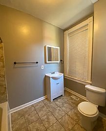 This Two-Story Single-Family Home Will Fit All of Your Needs! in Saint Louis, MO (Photo 4 of 10)