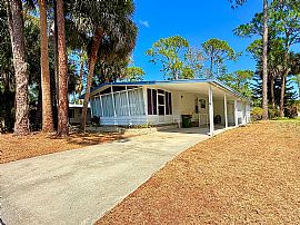 This Beautifully Updated 1983 Palm Harbor Home Features  in Port Orange, FL