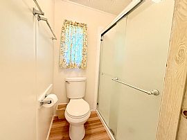 This Beautifully Updated 1983 Palm Harbor Home Features  in Port Orange, FL (Photo 11 of 12)