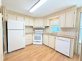 This Beautifully Updated 1983 Palm Harbor Home Features  in Port Orange, FL (Photo 2 of 12)