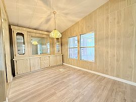 This Beautifully Updated 1983 Palm Harbor Home Features  in Port Orange, FL (Photo 4 of 12)