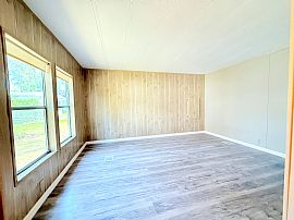 This Beautifully Updated 1983 Palm Harbor Home Features  in Port Orange, FL (Photo 9 of 12)