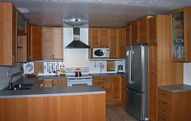 Open floorplan with new kitchen in San Juan Capistrano, CA (Photo 1 of 3)