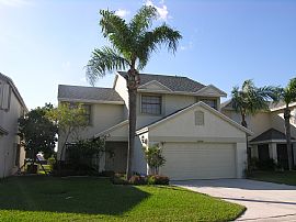 Custom designed home on golf/lakeview in Boynton Beach, FL