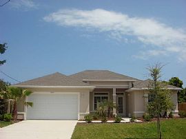 Walk to the beach in this 4BR/2BA in Ponce Inlet, FL