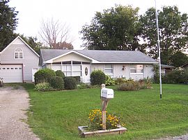 beautiful flower beds lovely ranch house in Belleville, MI