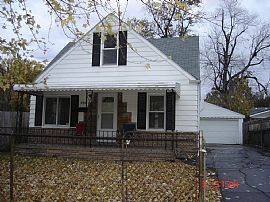 Home with Fenced-in yard and Huge Garage in Hazel Park, MI