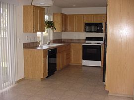 Home situated on golf course in Yelm, WA (Photo 2 of 5)