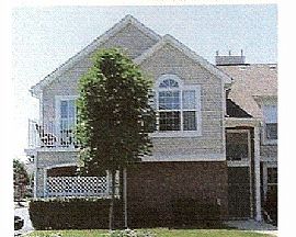END UNIT CONDO in Shelby Township, MI