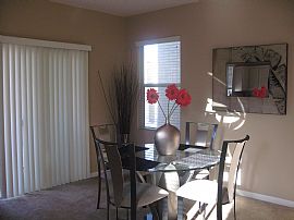 CHARMING TRI-LEVEL HOME IN TUSCANO  in Henderson, NV (Photo 3 of 5)