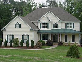 5 bed, 5.5 bath home on lake with pool in Cumming, GA