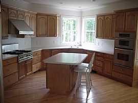 5 bed, 5.5 bath home on lake with pool in Cumming, GA (Photo 2 of 6)