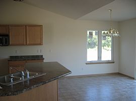 New Ranch on 1/2 Acre Next to Woods/Golf in Caledonia, WI (Photo 4 of 5)